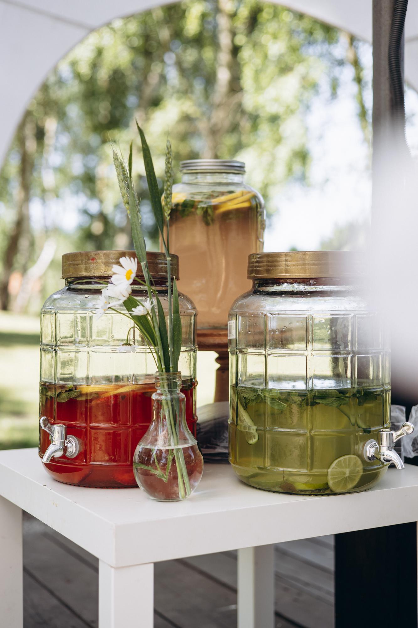 Close-up of preserved herbs in jars